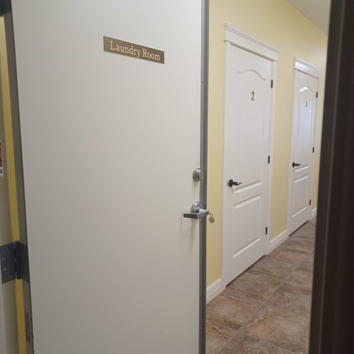 In-Swing Astragal Door Lock on Laundry Door - Open